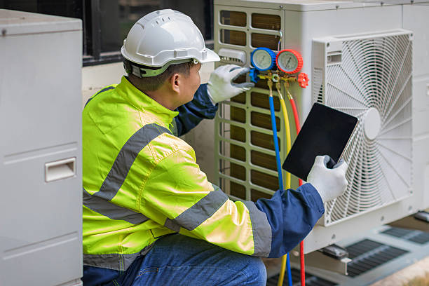 Professional Hvac technician working in Covington, VA